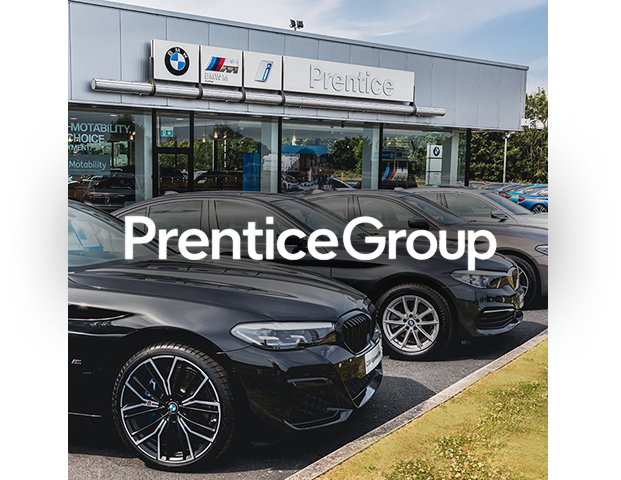 Prentice BMW dealership exterior with cars outside the showroom